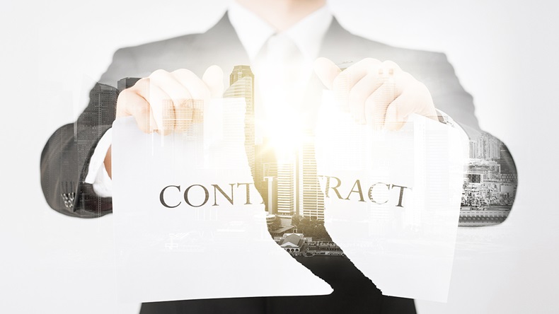 Tear up contract (Syda Productions/Shutterstock.com)